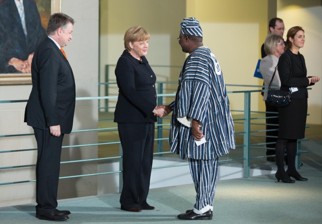 Angela Merkel welcomes the Ambassador of Ghana, Paul King Aryene.