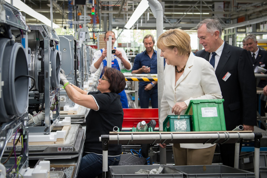 Angela Merkel in the Miele factory