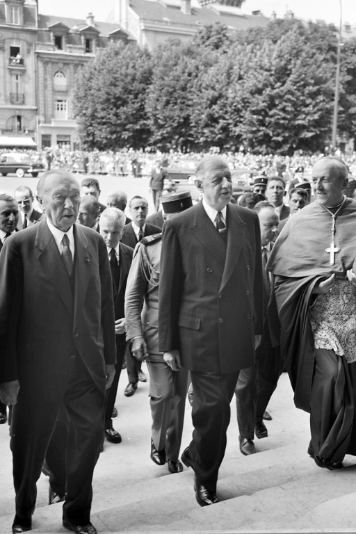 Federal Chancellor Konrad Adenauer and French President Charles de Gaulle in front of Notre-Dame de Reims Cathedral.