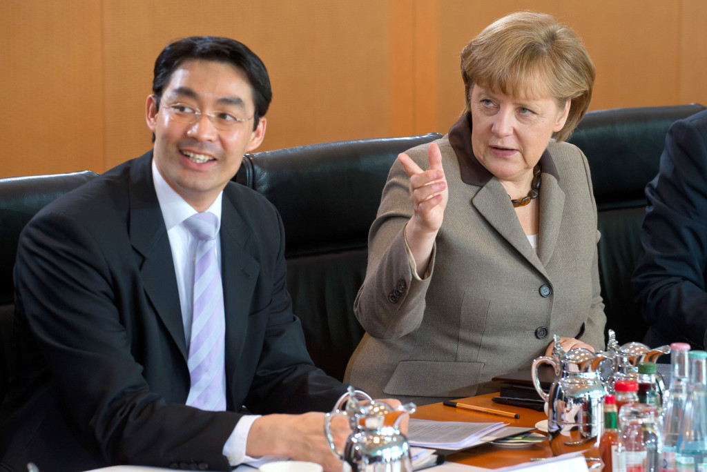 Chancellor Angela Merkel and Vice-Chancellor Philipp Rösler at the Cabinet table.
