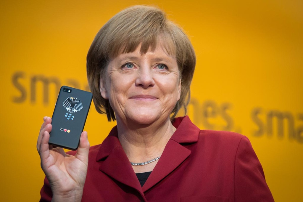 Angela Merkel with the secure mobile phone