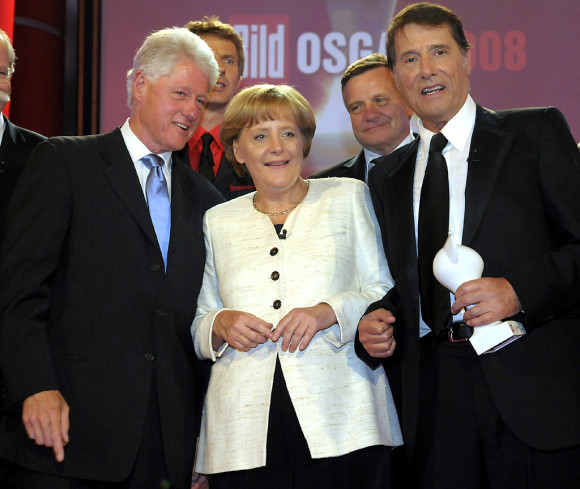 Chancellor Angela Merkel with prizewinners Bill Clinton, Hartmut Mehdorn and Udo Jürgens