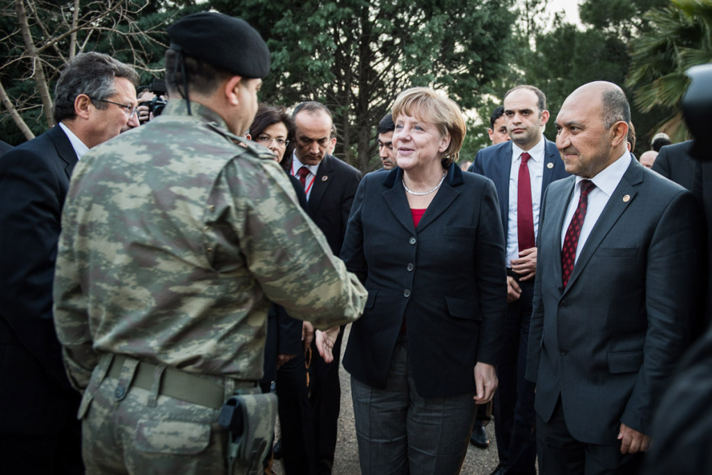Chancellor Angela Merkel is greeted by the Turkish commanding officer Colonel Kazaz at the Kahramanmaras Base.