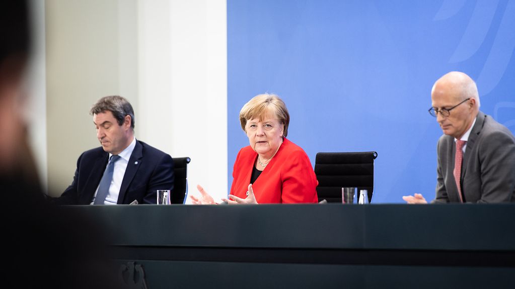 Chancellor Angela Merkel speaks at a press conference following her meeting with the premiers of the federal states.