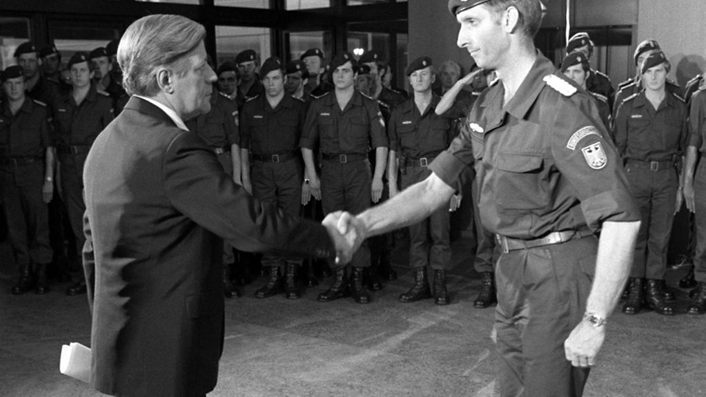 Chancellor Helmut Schmidt (left) welcoming the Commander of the GSG9 Police Special Forces, Ulrich Wegener