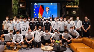 Chancellor Angela Merkel with the German national football team