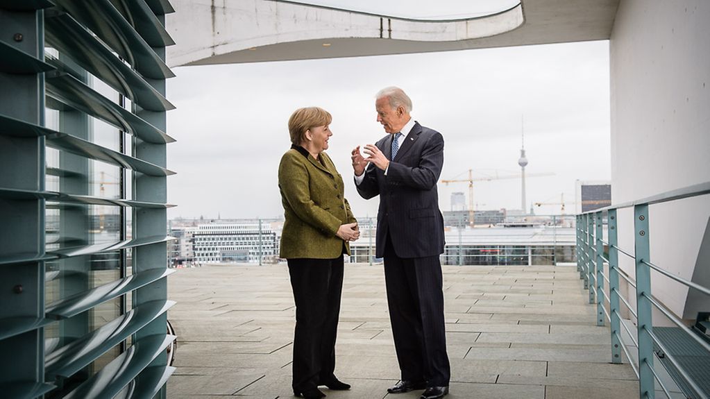 Angela Merkel and Joseph Biden in discussion