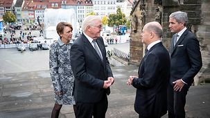 Federal Chancellor Olaf Scholz in conversation with Federal President Frank-Walter Steinmeier, his wife Elke Büdenbender and Stephan Harbarth, President of the Federal Constitutional Court, on the Day of German Unity in Erfurt.