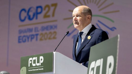 Federal Chancellor Olaf Scholz speaking at the press conference.