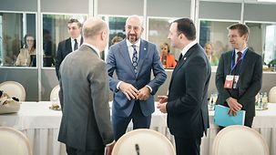 Federal Chancellor Olaf Scholz in conversation with Charles Michel, the President of the European Council, and the Georgian Prime Minister Irakli Garibaschvili