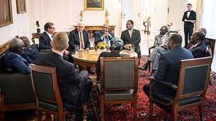 Federal President Frank-Walter Steinmeier talking to African heads of government at Bellevue Palace.