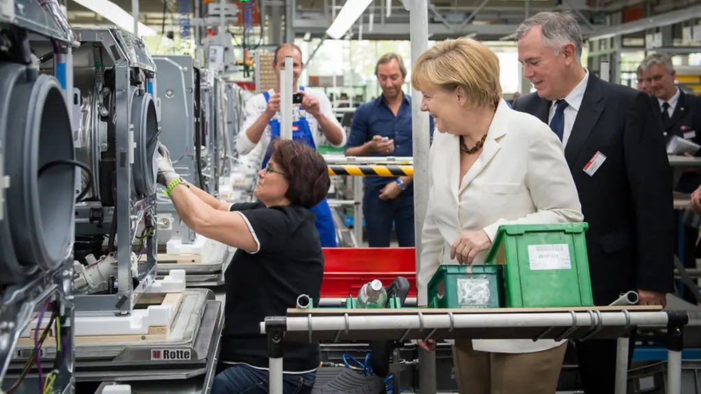 Angela Merkel in the Miele factory