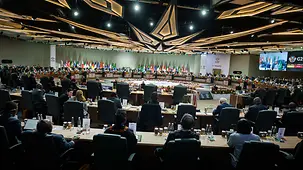 The photo shows a meeting at the G20 summit.