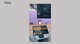 Das Foto zeigt Kanzler Merz bei einer Videokonferenz mit Soldatinnen und Soldaten im Auslandseinsatz.