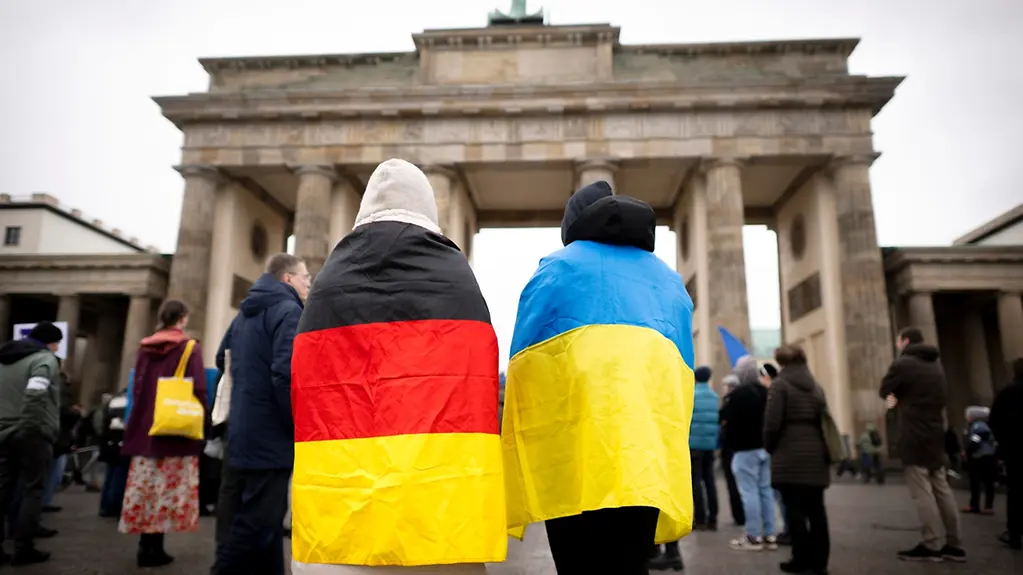 Demonstrators with German and Ukrainian flags in Berlin.