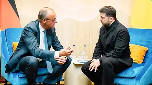 Federal Chancellor Friedrich Merz in conversation with Volodymyr Zelenskyy, President of Ukraine.