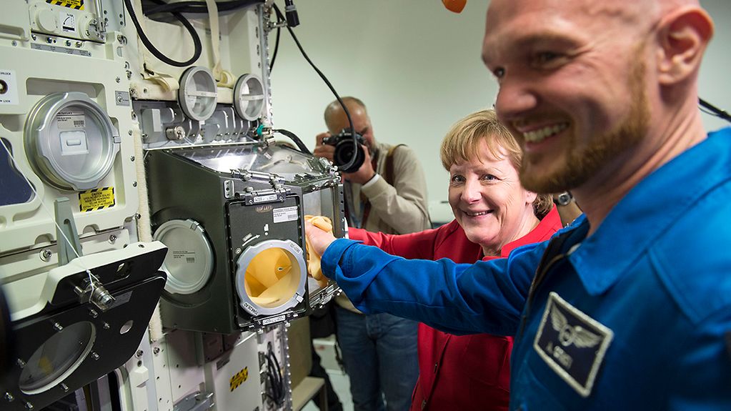 Chancellor Angela Merkel visits the national aeronautics and space research centre (DLR) in Cologne.
