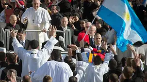 Pilgrims welcome Pope Francis on St. Peter's Square.
