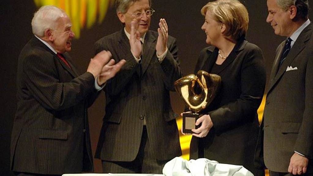 Chancellor Angela Merkel accepting the award