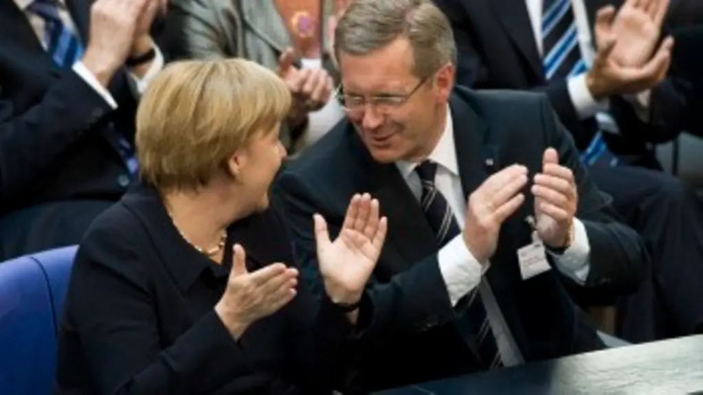 Angela Merkel and Christian Wulff in conversation