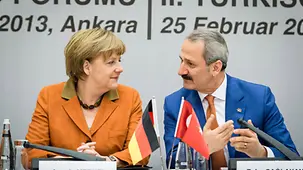 Before her talks with representatives of the German and Turkish business communities and the subsequent German-Turkish Business Forum Angela Merkel was welcomed by Turkish Economics Minister Safer Caglayan.