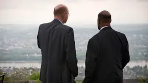Two men enjoy the view from the Petersberg near Bonn.