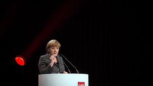 Angela Merkel speaks at the opening ceremony.